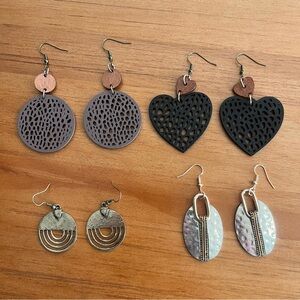 Four pairs of dangly boho earrings in wood and metal brown black gold silver